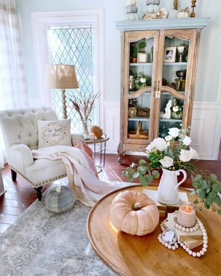 30 Fall Coffee Table Decor Ideas to Warm Up Your Home 23 White Tufted Chair and Coffee Table