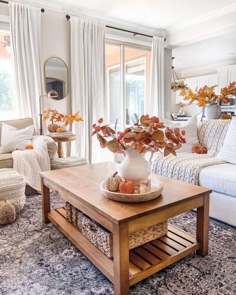 30 Fall Coffee Table Decor Ideas to Warm Up Your Home 11 White Vases with Autumn Leaves
