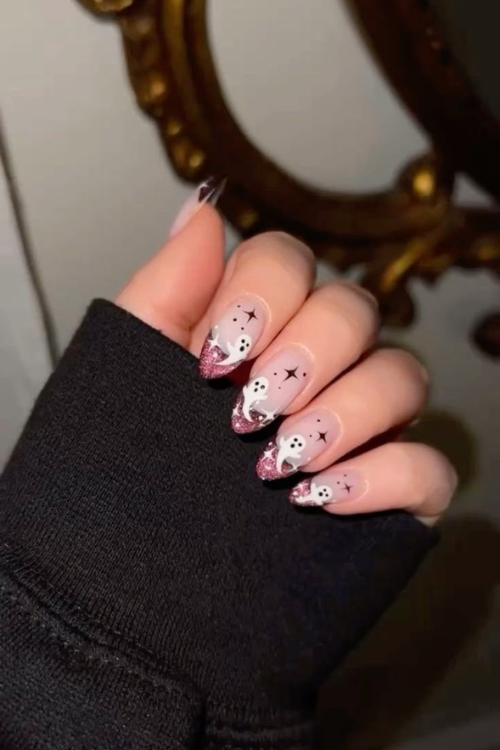 30 Halloween Nail Art Ideas 2025 for a Hauntingly Good Look 5 glittery tips with ghosts