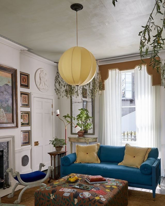 15+ Blue and White Living Room Ideas for a Timeless Look 11 Eye-Catching Prussian Blue Sofa and Chair
