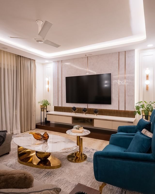 15+ Blue and White Living Room Ideas for a Timeless Look 5 Dazzling Blue Snuggler Sofa on Hollywood Glam Design