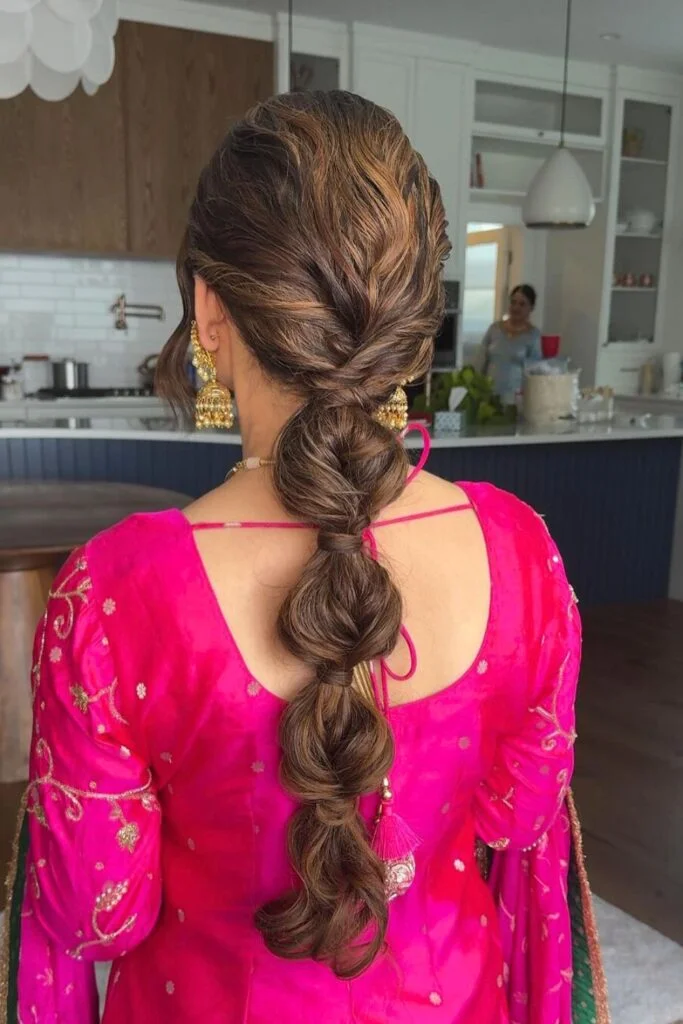 Sleek and Stylish: 20 Low Ponytail Hairstyles You’ll Love 18 Intricate Braided Low Ponytail