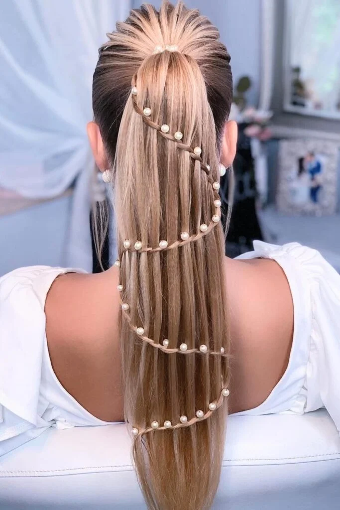 Sleek and Stylish: 20 Low Ponytail Hairstyles You’ll Love 16 Pearl-Adorned Low Ponytail