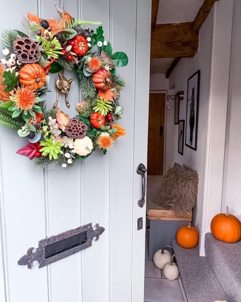 25 Chic & Cozy Fall Wreath Ideas to Celebrate the Season 7 Pumpkin and Foliage Wreath