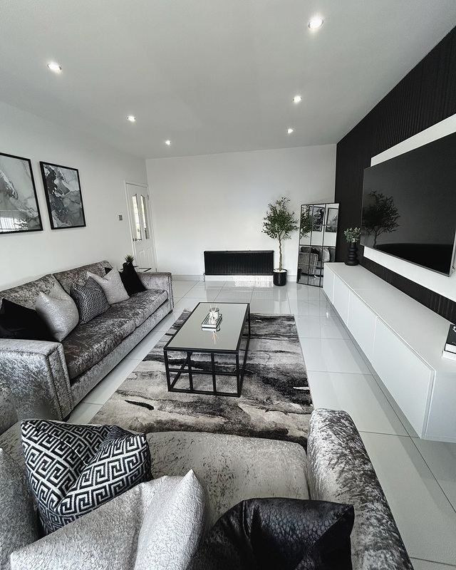 15 Formal Living Room Ideas for a Timeless Home 11 High-End Art for Cultural Depth