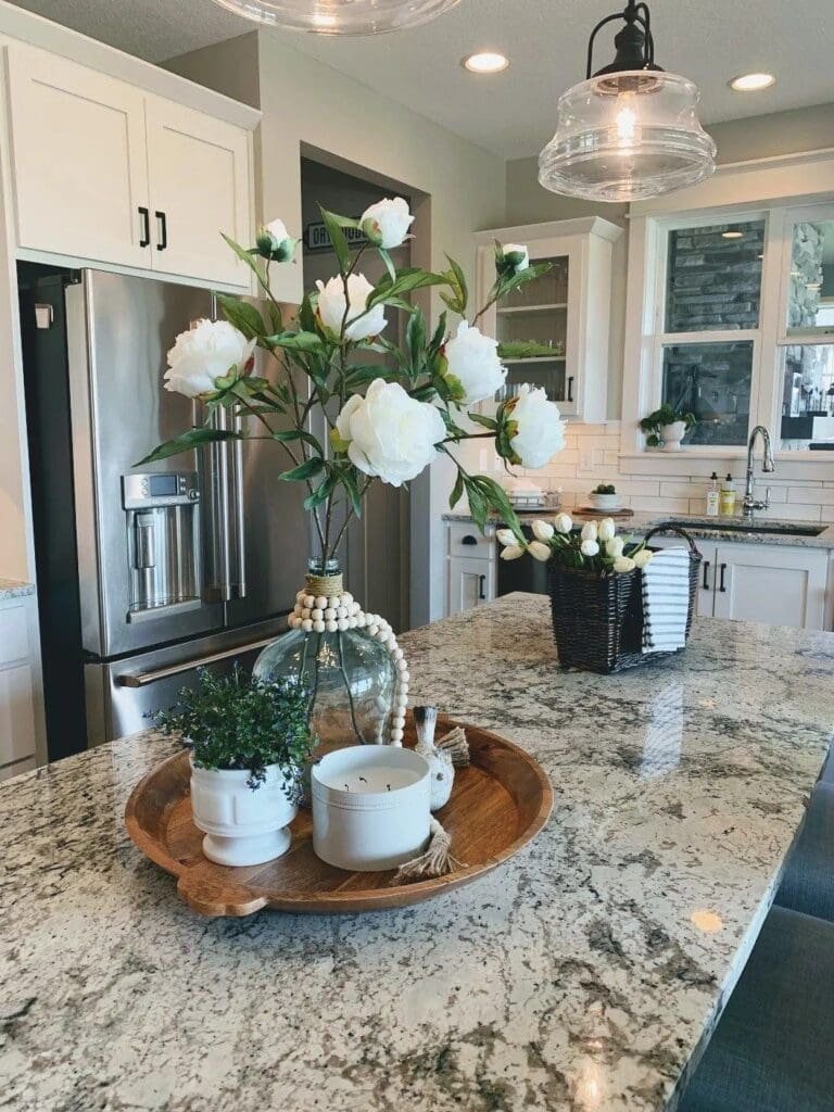 20 Beautiful Kitchen Island Centerpiece Designs 8 Floral Arrangement with White Peonies