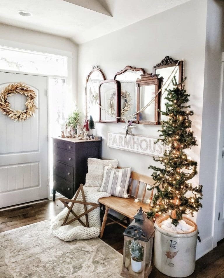 25 Christmas Entryway Decor Ideas for a Festive Welcome 21 Wreath Behind Door