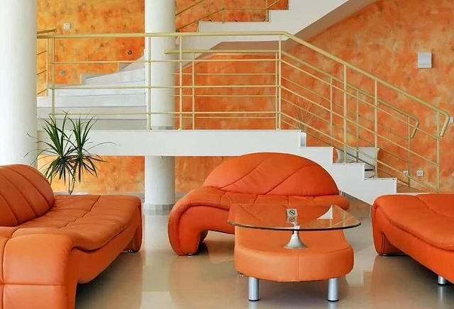 15 Orange Living Room Ideas for a Warm and Inviting Home 6 Neon Orange Art Deco