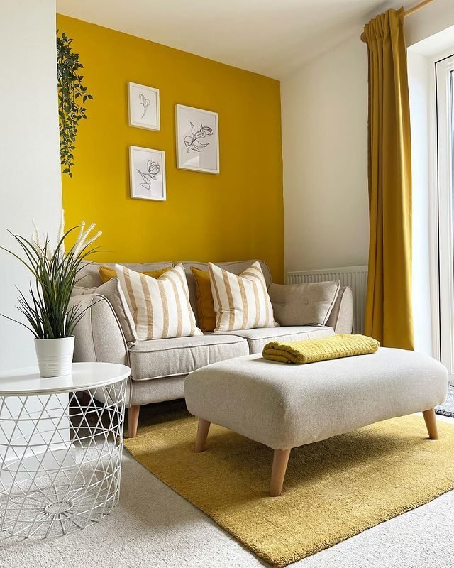 20 Yellow Living Room Ideas for a Cozy Yet Stylish Look 12 One Wall Paint Cadmium Yellow