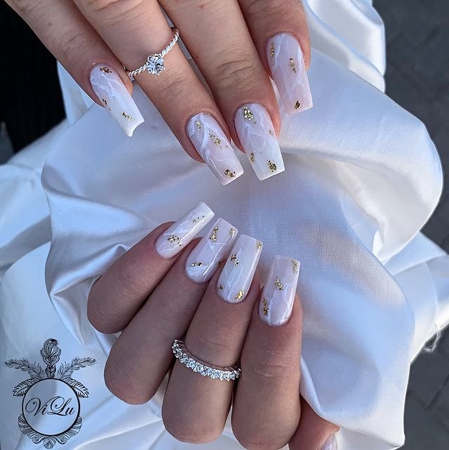 25 Elegant Winter Coffin Nail Designs You’ll Love 21 Snowy Marble
