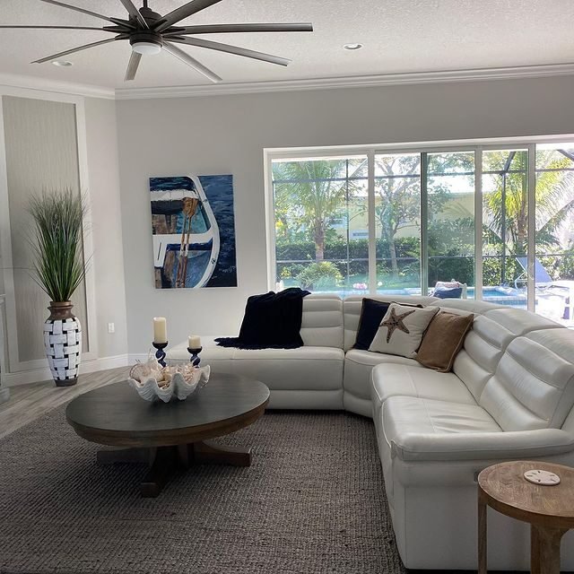 15 Coastal Living Room Decor Ideas for a Fresh, Airy Feel 3 Nautical Art Feature