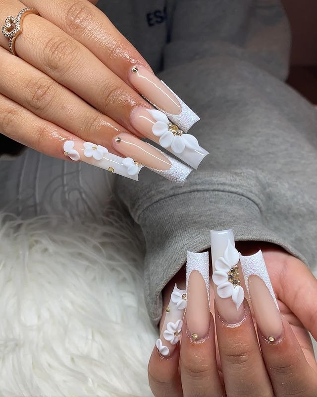 25 Elegant Winter Coffin Nail Designs You’ll Love 5 Snowy Floral Nails