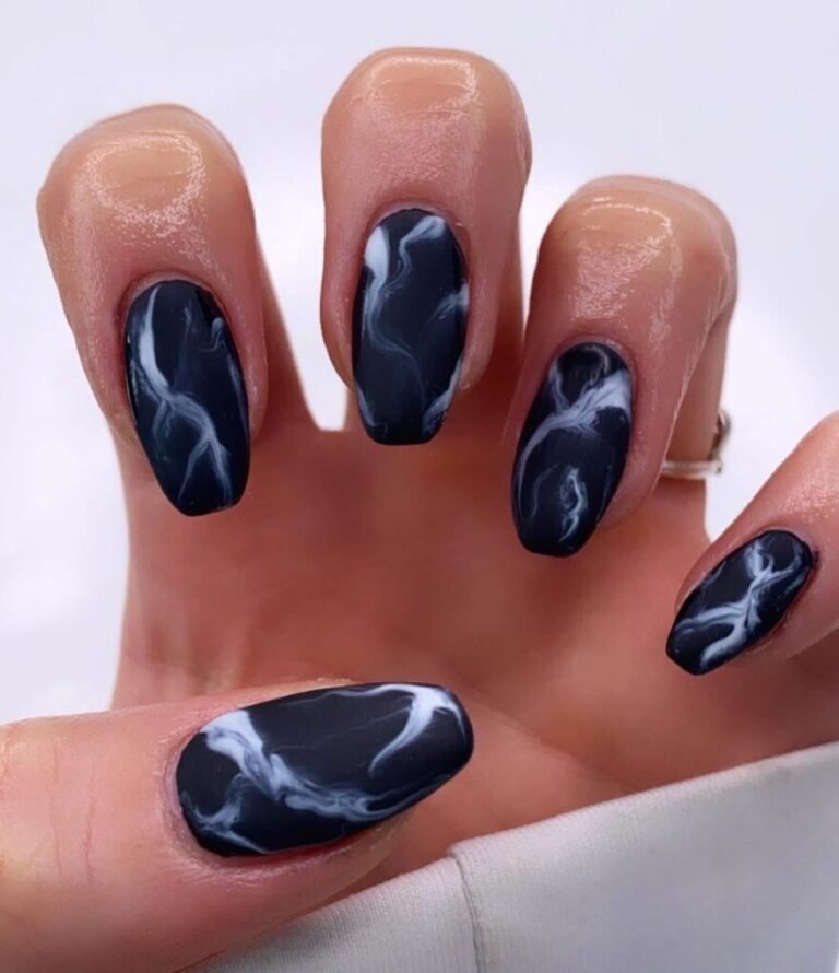 20 Elegant Black and White Christmas Nail Designs for 2025 5 Elegant Marble Accents