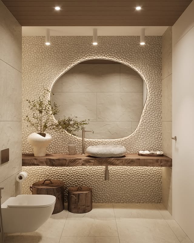 15 Stylish Bathroom Décor Ideas for a Modern Refresh 16 Create an Accent Wall with Pebbles